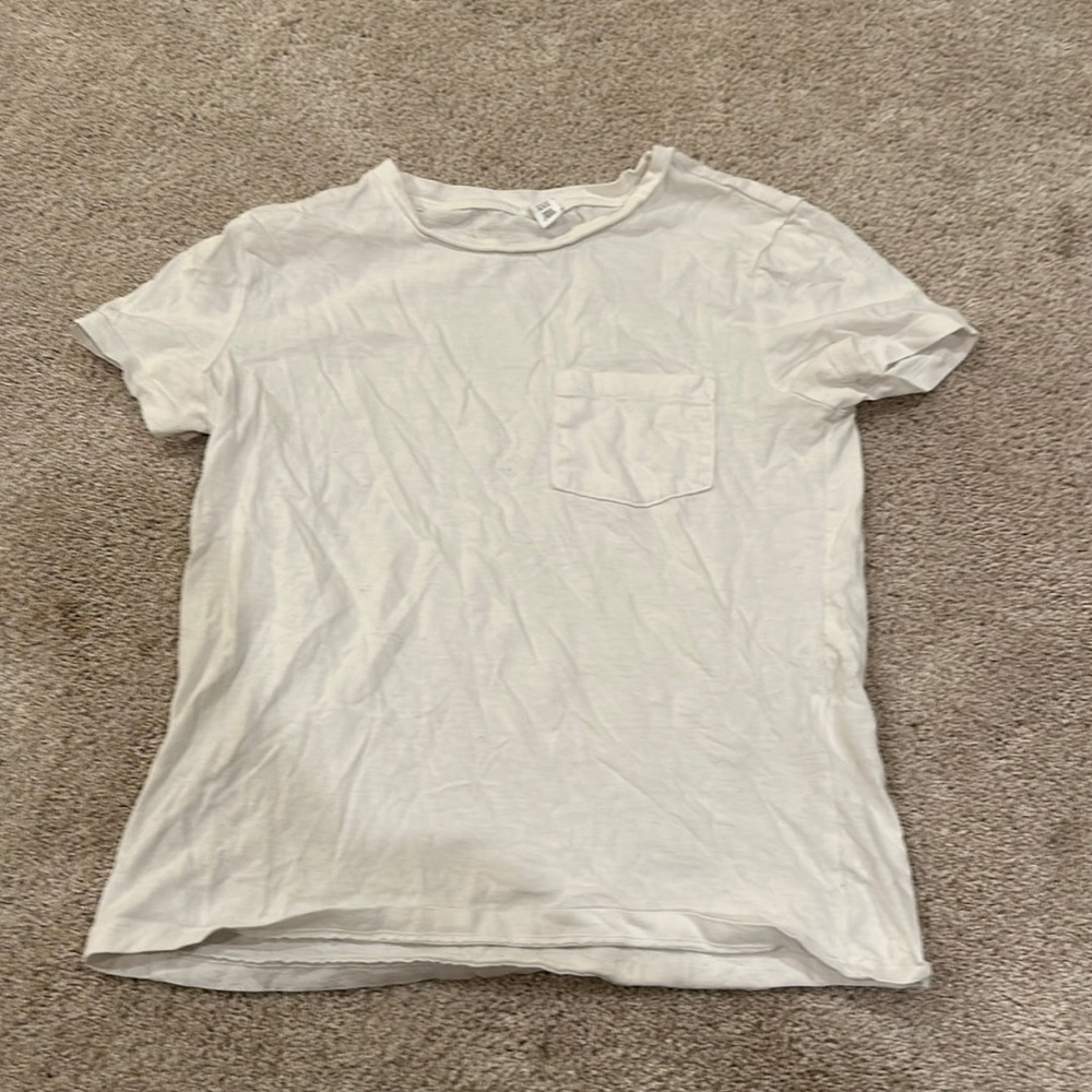 Plain white top with front pocket